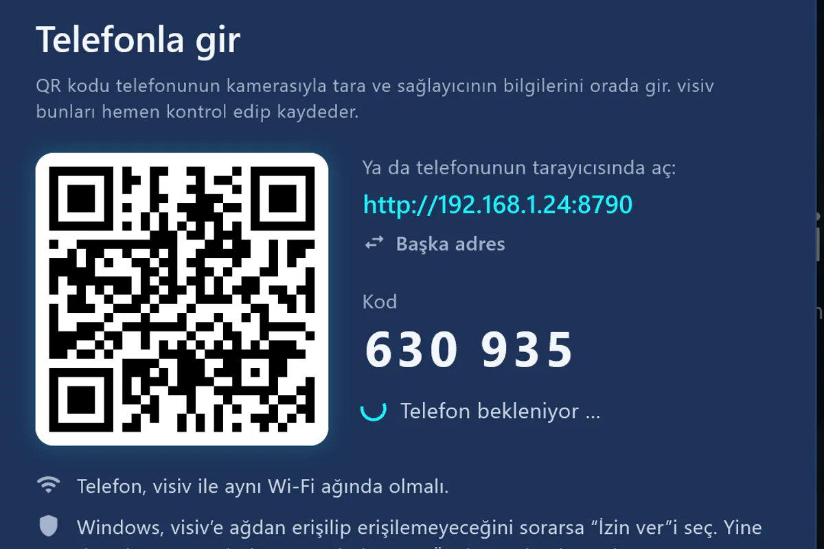Telefonla gir: QR kodu tara, kodu gir – visiv telefonu bekliyor.